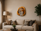 A decorative wood slice wall art piece featuring a carved eagle design, shown mounted on a beige wall above a desk. 

