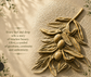 Decorative olive branch wall art in a textured beige setting with elegant text on the left and soft leaf shadows across the surface.


